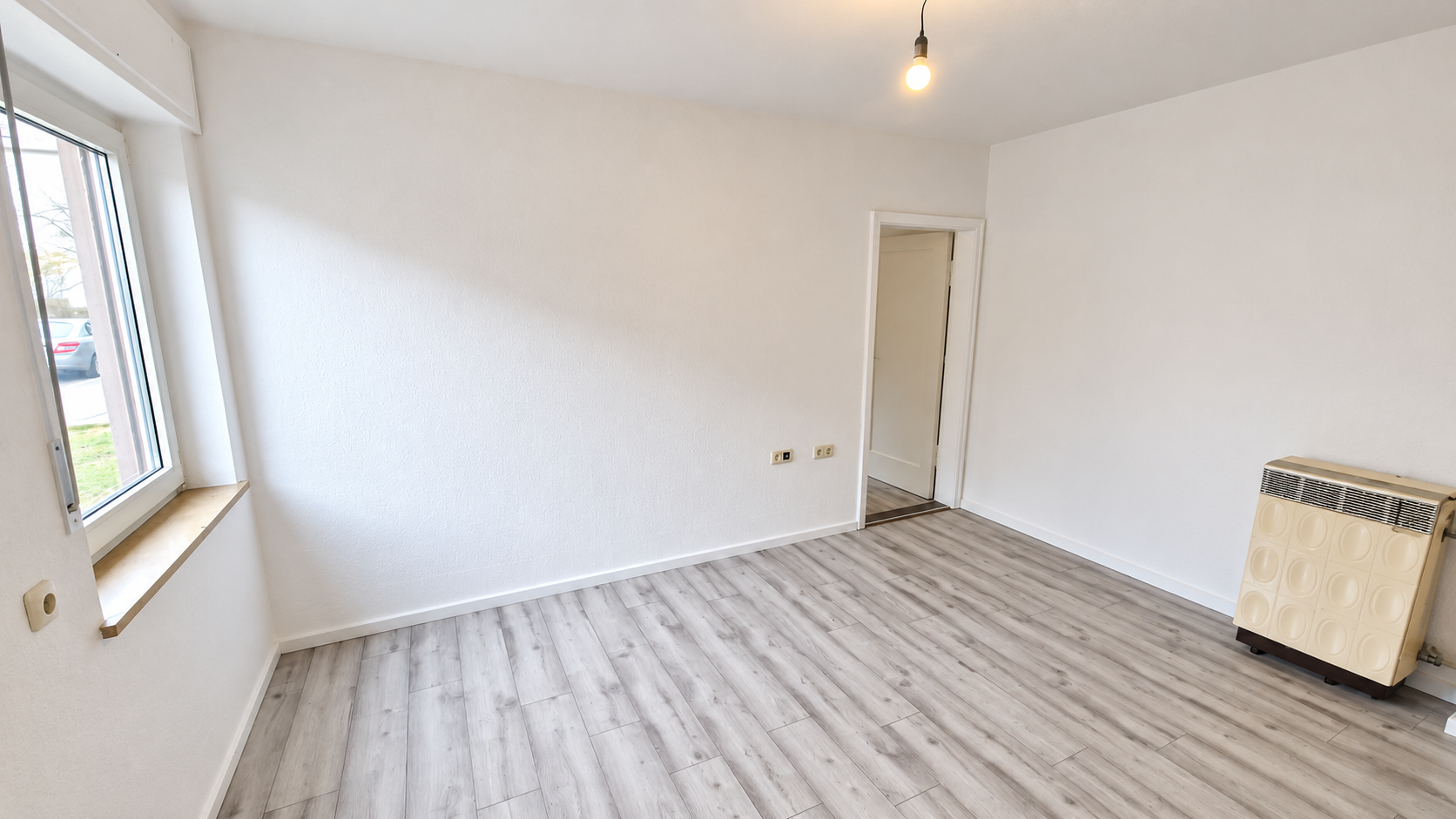 Wohnbereich mit Blick zum Schlafzimmer