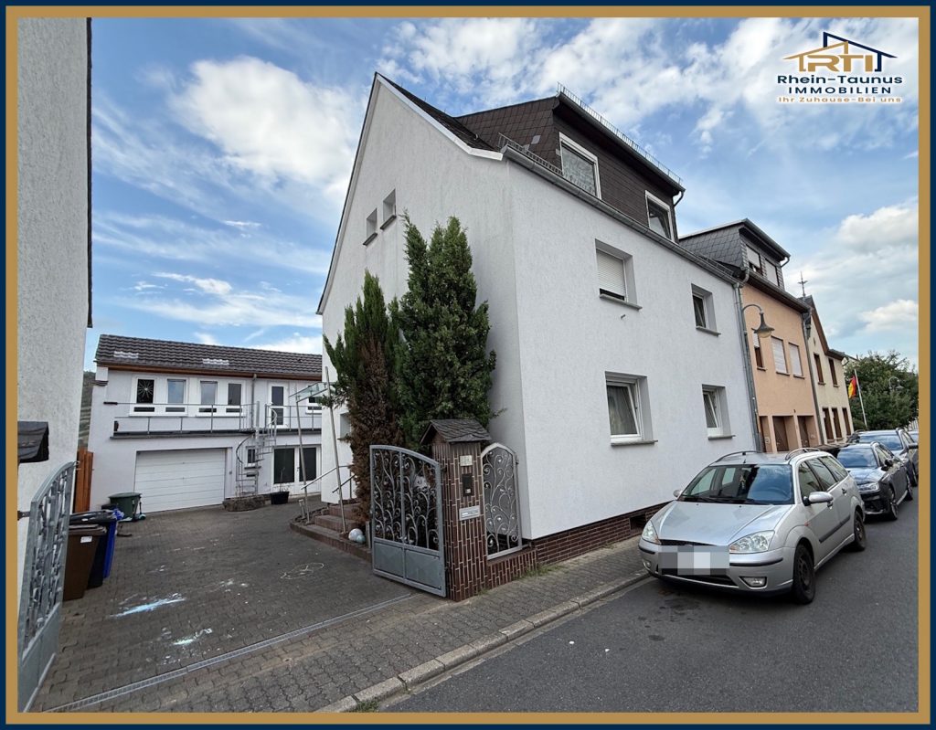 „Wohnen und Arbeiten in Koblenz-Lay: Wohnhaus mit Gewerbemöglichkeiten“